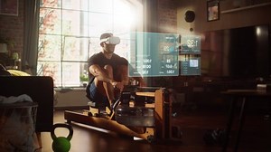 Virtual Reality Metaverse Futuristic Home Gym: Man Exercising on Row Machine Wearing Virtual Reality Headset, Infographics Show Health Care Statistics and Graphs. Sportsman Using VR Workout Service