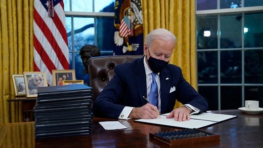 Fact check: What Biden said as he signed documents in Capitol is unclear