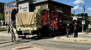 Caught on camera: Train and military truck collide in Plymouth