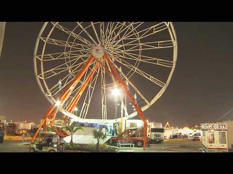 HD Time Lapsed Transforming Ferris Wheel - Carnival Rides - HD Stock Footage