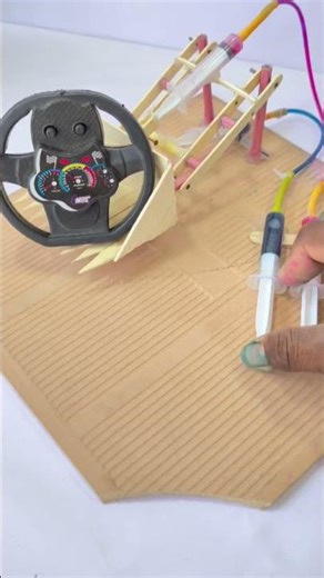 बुलडोजर से गाड़ी का टायर को गिराया DC motor new project