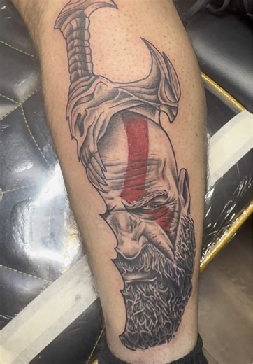 Stunning Kratos Tattoo: Black, Grey, and Red Design