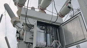 Connecting and setting up an industrial transformer, an electricity distributor in a substation.
