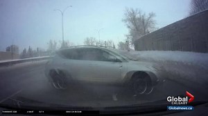 Dash cam video captures near miss on Crowchild Trail in Calgary