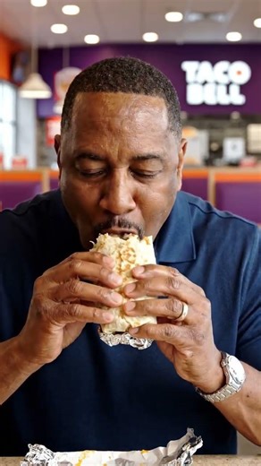 it's a guy who's eating Taco Bell how satisfying