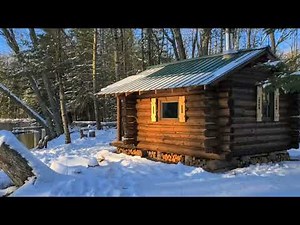 Surviving winter in a log cabin off grid! Snowy and bitter cold conditions.