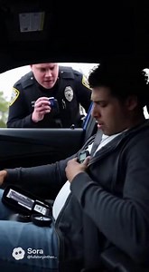 OP PULLS OVER A SWERVING DRIVER—BUT WHEN HE LOOKS IN THE WINDOW, IT’S NOT FEAR IN HER EYES She wasn’t speeding. She wasn’t on her phone. But her car had been drifting between lanes for almost a mile. Officer Dalen hit the lights. Standard traffic stop. Probably just tired or distracted. But when he approached the window, something felt… off. The woman behind the wheel was shaking. Not crying. Not angry. Not defiant like the usual “Why’d you pull me over?” routine. Just… shaking. Silent tears. He