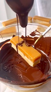 1.6M views · 22K reactions | EASY HOMEMADE TWIX BARS(Dairy-Free) Buttery shortbread, homemade gooey vegan caramel wrapped in dairy-free chocolate! SO GOOD!! RECIPE IS IN COMMENTS ⬇️⬇️⬇️ #twix #twixbar #vegantwix #dairyfree #veganfood #easyrecipes #bakibg #caramel #candybar #homemadetwix #chocolate #veganrecipes | The little Blog of Vegan | Facebook