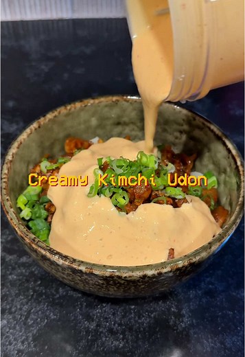CREAMY KIMCHI UDON RECIPE - Pork Belly - Udon - Kimchi - Onion - Scallion - Garlic Kimchi Tofu Cream Sauce - Silken Tofu - Kimchi - Kimchi juice - Gochuchang - Sesame oil Pork Belly-Kimchi Mix - Pork Belly - Diced kimchi (Bibigo is my favorite brand) - Scallion - Garlic - Pinch of Salt - Sugar - Black Pepper - Soy sauce - Gochuchang - Cooking wine 1. In a wok over medium eat, stir fry Pork Belly until the fat renders (releases oil) and get a slight crispy layer on both sides 2. Season with salt,