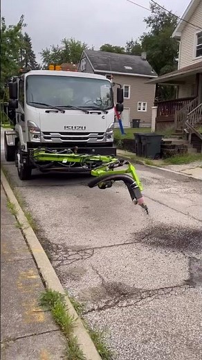 This $300,000 Truck Fixes Potholes In 2 Minutes