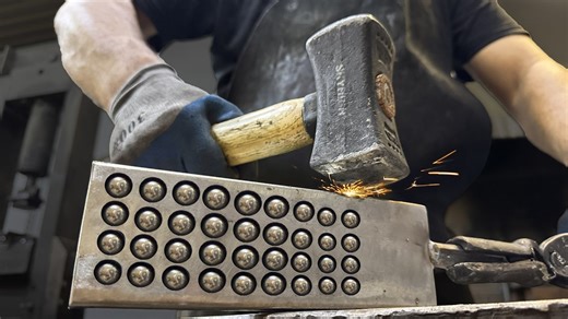 Forging a knife with 32 steel balls inside the blade