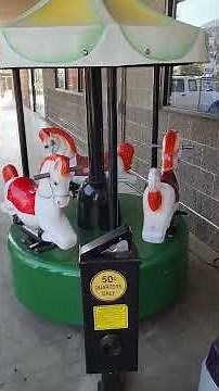 1970s Mini carousel kiddie ride (Green, black, mint green, white and yellow)