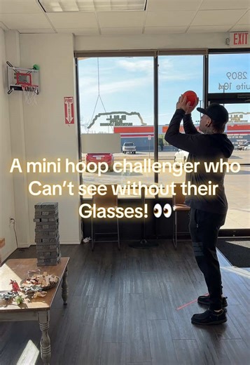 Mini Hoop Challenge with Glasses: Fun Basketball Moments