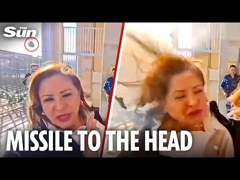 Horror moment politician hit by BOMB thrown by protester during live TV press conference