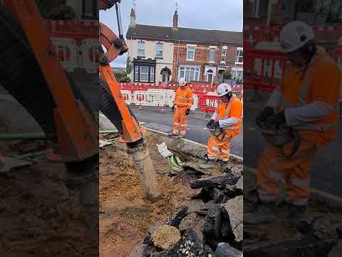 Vac UK, digging around the footway utility cables to expose the pipes safely and efficiently.