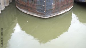 The reflection of a boat on the water that creates a cool background.
