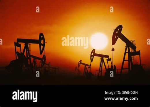 Oil Pumpjack Silhouettes Against Sunset Sky Industrial Background. Smooth seamless animation Stock Video Footage - Alamy
