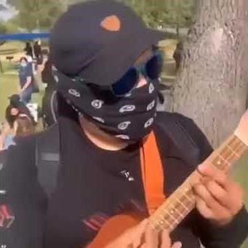 man plays spongebob (Twelfth Street Rag) on ukulele