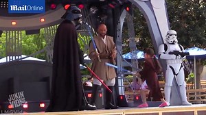 This kid actually think's he's a Jedi fighting Darth Vader
