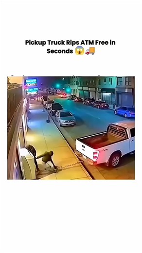 💀 on Instagram: "Security cameras caught a daring theft in progress late last night. Two individuals can be seen hooking a heavy chain from the back of a white pickup truck to a standalone ATM. In a matter of seconds, the truck accelerates, tearing the machine from its anchors and dragging it down the road. The sheer force creates a trail of sparks as the suspects make their getaway. Police are likely reviewing footage like this to track down the vehicle involved. 🚓💨 #heist #caughtoncamera #s