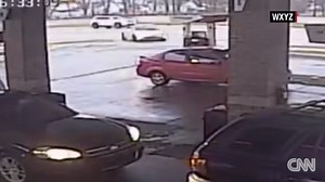 Explosion after car crashes into gas station