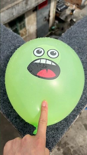 Experiment: Will a water balloon explode if it rolls down a tall building? 💥🎈 #balloon