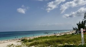 1.4K views · 179 reactions | The beaches of #GrandBahamaIsland have re-opened, and we thought we'd give you a peek into the wide open spaces that we can't wait to share with you!  We're keeping it safe under the island sunshine, social distancing and staying in groups of 5 or less. Come join us!  | Visit Grand Bahama Island | Facebook