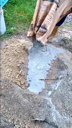 Manual Cement and Soil Mixing Process for Ground Foundation Work