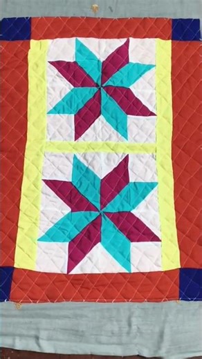 "Vibrant handmade quilt baby blanket! 🌈✨ #handmadequilt #babyblanket #quiltinglove #homemadegifts"