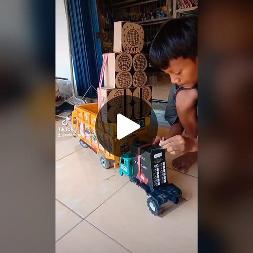 Engaging Playtime with Toy Truck and Telephone