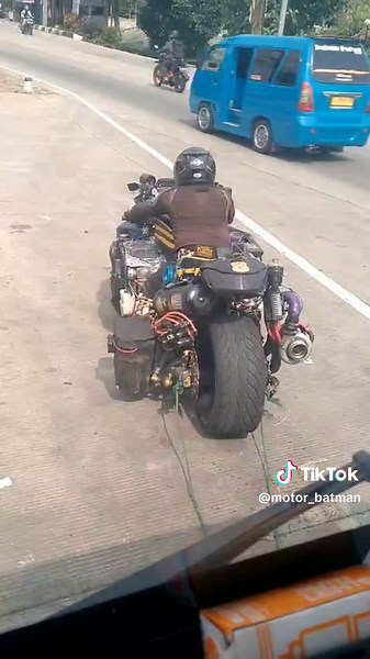 Batman's Turbocharged Motorcycle Showdown