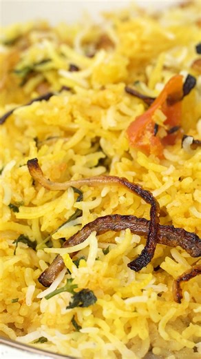 Chicken Biryani — tender chicken, fluffy basmati rice, and bold, warm spices layered into the ultimate cozy, special occasion dinner. Recipe link in comments 👇 | JoCooks
