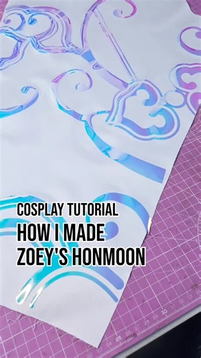 Alice in Cosplayland on Instagram: "This was supposed to be easy but I ended up spending way more time than I would like cutting the patterns for Zoey's Honmoon! 💠 You can download the cutting files on my website. Just make sure you go for a deeper cut! #cosplaytutorial #cosplaytip #kpopdemonhunters #zoeycosplay #cosplay #cosmaker"