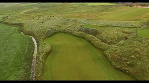 A change in direction as the golfer starts making their way back towards home from the most northern part of the course. Beware the stream that crosses the fairway, particularly when the tee shot is down wind. The entrance to this green is a gap only 11 paces wide between the stream on the left and a sand dune on the right. The green is 44 yards deep, make sure you know where the pin is! | Trump International Golf Links & Hotel Ireland, Doonbeg
