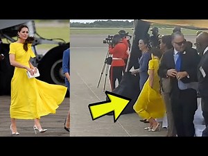 Wardrobe malfunction - Kate holds onto her yellow dress in windy arrival in Jamaica