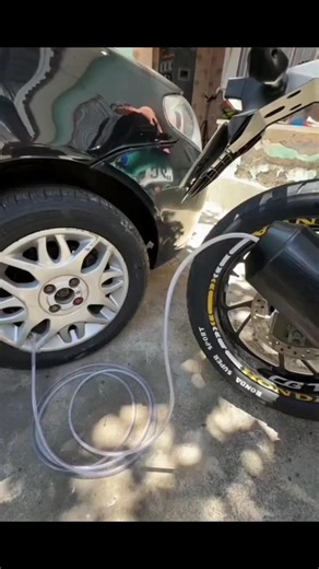 "How to inflate a Car Tire using a Motorcycle" #repair #mechanic #foryou