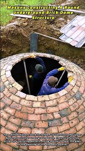 Masons Constructing A Round Underground Brick Dome Structure With Cement