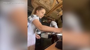 Adorable moment Harper Beckham salsa dances and cooks with David