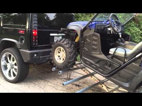 Side by side ATV on a tow dolly trailer Rhino RZR