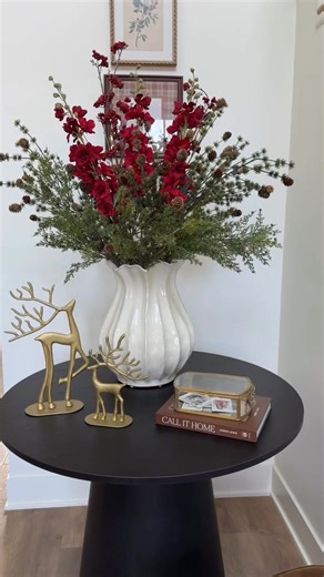 Setting the entryway for the season ✨⁠ A few red blooms, brass details, and our Dwen 35’’ entry table doing what it does best — making a small corner feel like a moment.⁠ ⁠ Soft, modern, and just a little festive 🤎⁠ ⁠ #popmaison #holidaydecor #entrywaydecor #christmasaesthetic #modernhome | Pop Maison