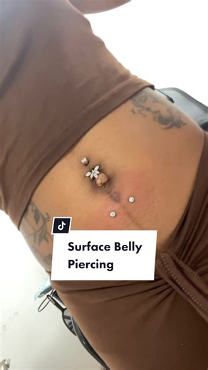 This is a surface belly piercing, that I impulsively decided to do on myself. I used a 90° staple barbell, which is to be used instead of a curved barbell to avoid and/or minimize rejection. My after care steps, policy, prices, reviews, and work can be found on my business Instagram in my bio. As well as live piercing videos, so you can see my process, and my set up. Whenever you are ready to get a piercing, you can contact me. I work Sunday-Saturday, 7AM-10PM (“-“ means through) Appointment onl