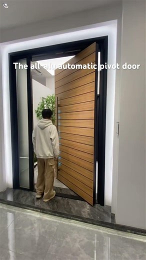 The all-alu automatic pivot door #aluminium #home #interiordesign #pivot #pivotdoor #doors #windows