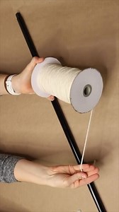 Dollar Tree Broom Organizer