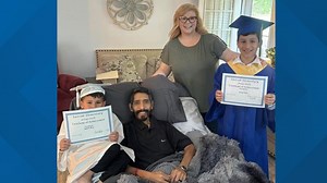 Georgia school brings graduation home for father in hospice
