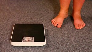 Overweight Woman On Scale Stock Footage Video (100% Royalty-free) 3281465 | Shutterstock