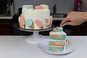 A couple weeks ago, my friend Danielle (@macarune) taught me how to make French macarons! We made a bunch of different kinds, including macarons shaped like ice cream cones and creamsicles. She sent me home with a box full of our delicious creations, and I couldn't resist adding them to a cake! They're so cute that they're the only decoration I used on this cake! To stick to the macaron theme, I flavored both the cake and buttercream with almond extract. I added 2 tsp of almond extract to my van