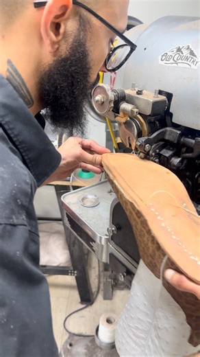 “Precision in every stitch. Kenny sewing the bottom welt on the Landis – where craftsmanship meets durability. #OldCountryBoots #HandmadeInUSA #CowboyBoots #Leathercraft #BootMaking” | Old Country Boots