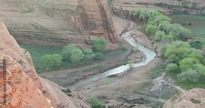 Hiking trail passing by a stream at the Canyon de Chelly, next to the Spider Rock.
