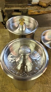I have had this little lid in my head for a bit now. Spin, reverse it and spin again. Flanged tooling isn't always necessary when you are just making a couple. For now. These will fit into the 1/8" thick cylinders I made a while back. (Wait til the end). 2 knobs were from old drawers, the hammered one I machined here. You can feel the air get pushed out when the lid goes down. Flour, sugar, coffee, tea, compostables headed to the compost, ..... who knows but the 3 will look great on any counter.