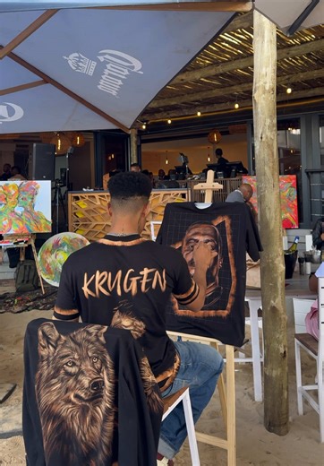 Painting @Grear JR using bleach on a T-shirt live in Paralia